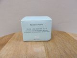 a box of skinceuticals on a wooden table