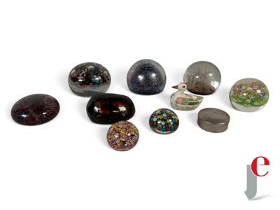a lot of stones that are sitting on a white surface