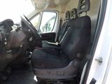 a picture of a truck with a seat and steering wheel