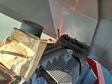 a small engine in the back of a red car