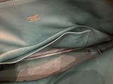 a purse that is open on a table