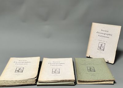 three books sitting on top of each other on a table