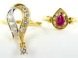 deux bagues en or serties de diamants et d'un rubis au centre