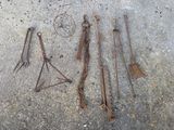 a lot of tools that are laying out on the ground