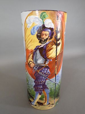 a vase with a picture of a man holding a sword