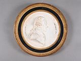 an antique portrait of a woman in a black and gold frame