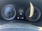 the dashboard of a car with a speedometer, gauges, and other instruments