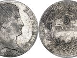 a close up of a coin with a woman ' s face on it