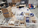 a table with a lot of boxes and containers on it