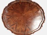 an image of a wooden table with a circular design on it