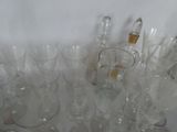 a lot of empty wine glasses on the table