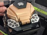 a person holding a tool box that has a tool in it