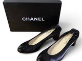 chanel black patent pumps