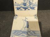 a small blue and white box with a boat on it