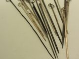 many different types of scissors on a white surface