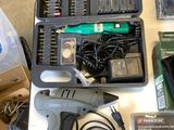 a picture of a table with a lot of electronics and tools