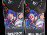 two boxes of one piece card games on display