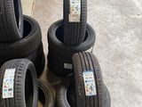 several tires stacked on top of each other in a warehouse