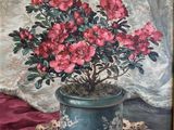 an oil painting of a potted plant with pink flowers on a doily