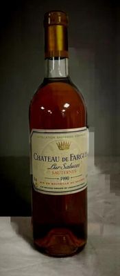a bottle of wine that is sitting on a table