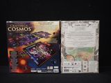 the box for the game of crafting cosmos is open and ready to be played