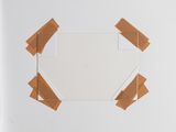a picture of a piece of tape taped to the wall