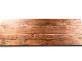 an image of a piece of wood that is laying on a white surface