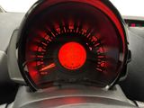 a close up of a speedometer in a car