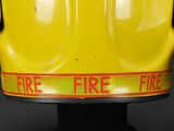 a close up of a yellow fire hydrant on a black background