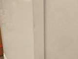 an image of a white refrigerator in a kitchen