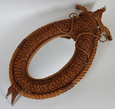 AUDOUX-MINET (ATTRIBUÉ À) Miroir ovale en cordage et cuir si…