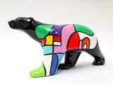 brightly colored bear figurine on a white background with a white background