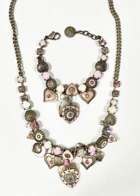 pink and silver necklace and bracelet set with heart charms