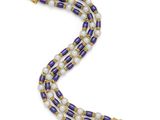 un bracelet en or, lapis-lazuli et perles, signé Van Cleef