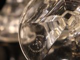 a close up of a glass object on a table