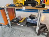 a workbench with tools on it in a garage