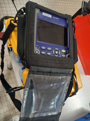 a bag that has a cell phone in it