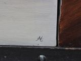 a close up of a painting of a cat on a shelf