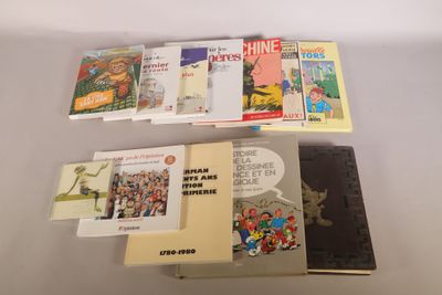 several books are stacked on top of each other on a table