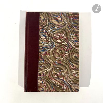 an image of a book with a red cover and a pattern on it