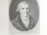 an old black and white portrait of a man in a suit