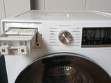 an image of a washing machine with the door open