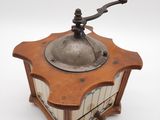 an old coffee grinder on a white background with a white background