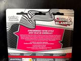 the box of a skateboard is sitting on a black surface