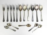 a lot of spoons and spoon spoons on the table