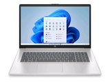 an open laptop computer sitting on top of a white surface
