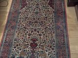 a rug on the floor in a living room