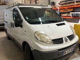a white van that is parked in a garage