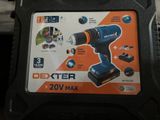 the box of a cordless drill is sitting on the table
