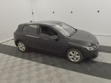 a picture of a black car parked in a garage